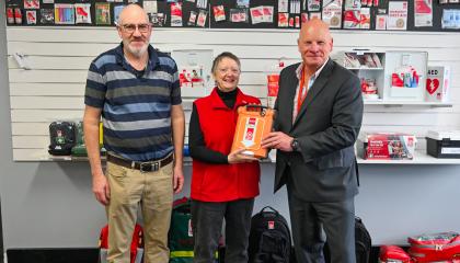 Peter Murrell Walkers receiving an AED