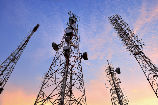 Telephone towers at sunset