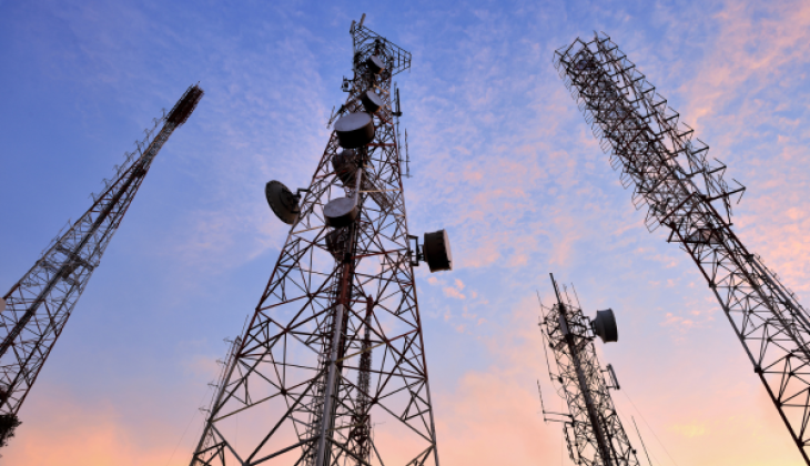 Telephone towers at sunset